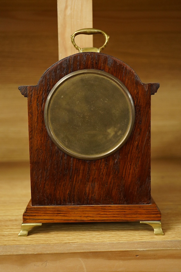 An Edwardian inlaid mantel timepiece, R. C. Marsh, Birmingham, 24cm high. Condition - poor/fair, glass cracked